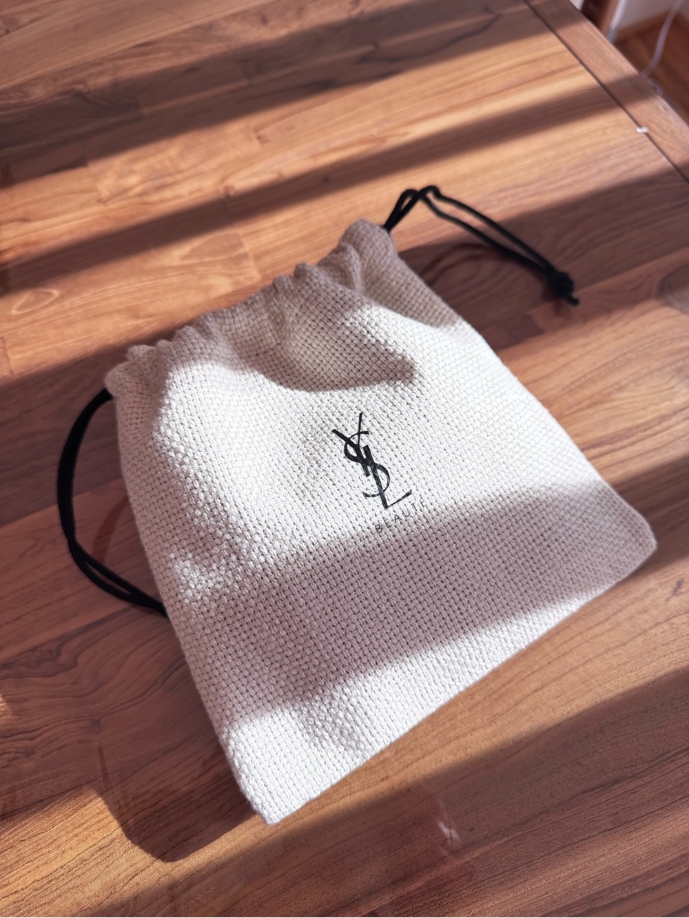 Yves Saint Laurent Beige Knit Drawstring Pouch with Black Cords